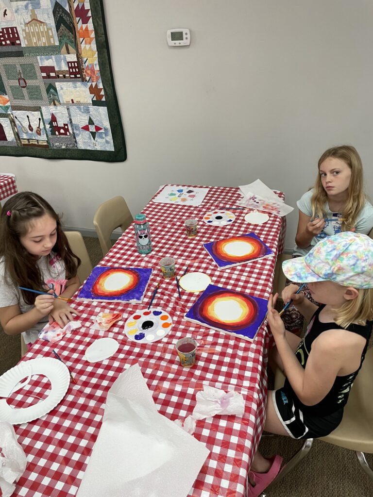 children working on craft projects