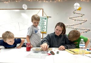family making ornaments together