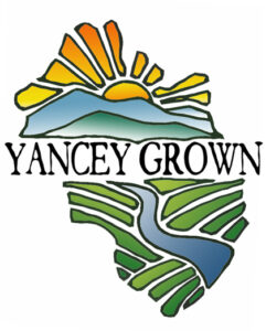 Yancey grown logo with mountains, fields and river